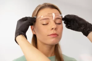 beautiful-young-woman-going-through-microblading-treatment_23-2149238691